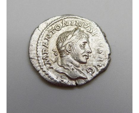 Elagabalus silver Denarius Rome Mint 221AD Laureate bust Imp Antoninvs Pivs Avg Reverse Sol, naked cloak over shoulder holdin