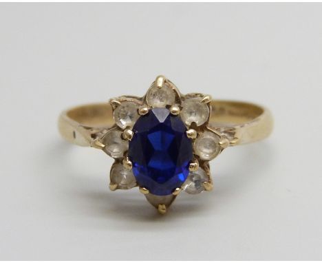 A 9ct gold, sapphire and white spinel cluster ring, 2.3g, P