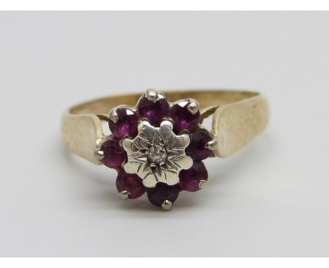 A 9ct gold, ruby and diamond cluster ring, 2.4g, M