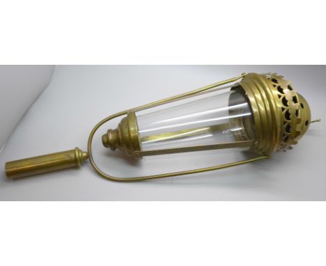 A religious processional lantern and pole fitting 