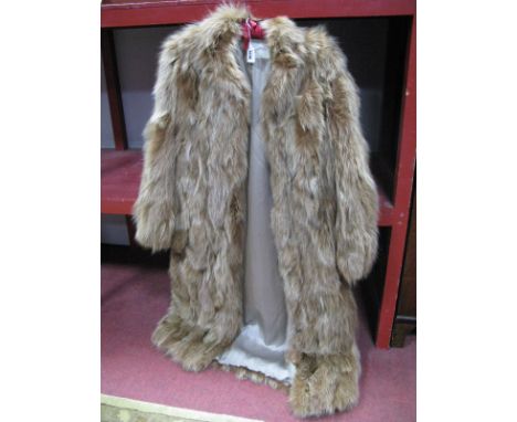 A Full Length Golden Fur Coat, retailers label for "Kingston Lee", collarless with inner drawstring waist, 120cm long.