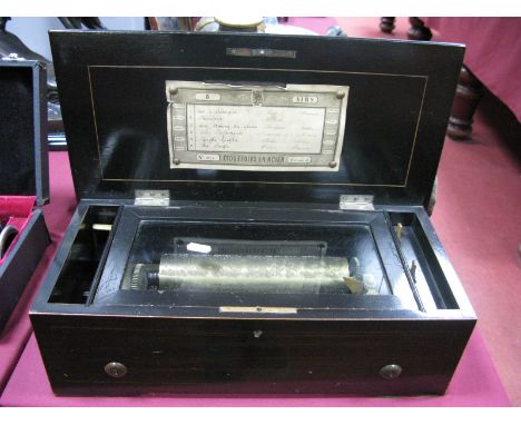 A XIX Century Musical Box by "Etouffoirs en Acier", playing six airs, No. 1072 to label, in inlaid rosewood and ebonised case
