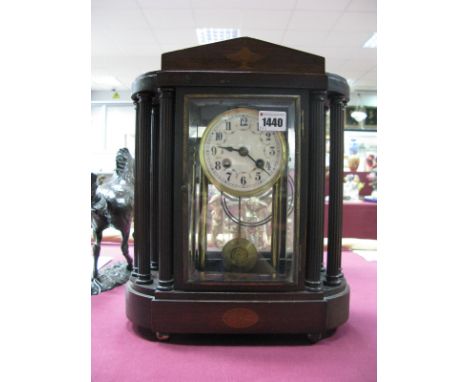 An Edwardian Inlaid Mahogany Eight-Day Mantel Clock, central bevelled door flanked by demi-lune fluted columns, the plinth ba