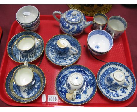 Three XVIII Century Caughley Porcelain Cups and Saucers, printed in blue with a Chinoiserie river landscape, each with gilt b