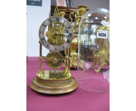 A Mid XX Century Brass Skeleton Clock, with fusée movement, the silvered chapter ring with black Roman numerals, under a glas