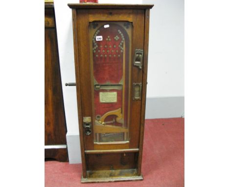 The Improved Pickwick Coin in the Slot Pinball Arcade Machine, c.1912, contained in an oak case with two labels; together wit