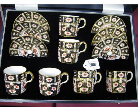 A Cased Set of Royal Crown Derby Porcelain Coffee Cans and Saucers, decorated in Imari pattern 2451, date code for 1968, the 