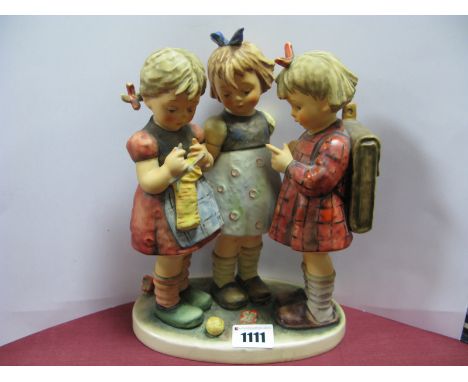 A Large Goebel Figure Group of Three Children, one knitting a sock, oval base, printed and impressed marks, 24cm high.