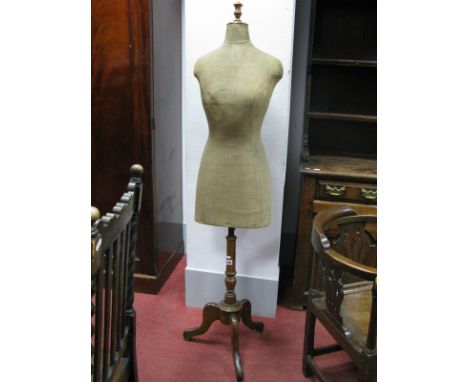 A 'Sages of London and Paris' Shops Female Mannequin, fabric covered with vase turned finial on adjustable support and tripod