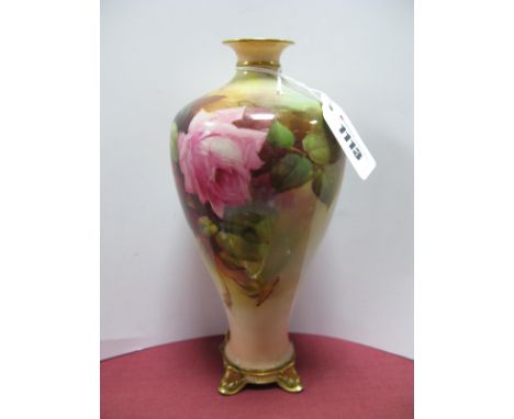 A Royal Worcester Porcelain Vase, of extended pear shape, raised on square scrolling gilt feet, painted with pink and red ros