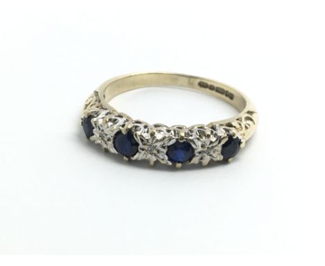 A 9ct yellow gold, sapphire and diamond half eternity ring, approx size I