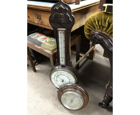 A W.G. Webber of Chelmsford carved oak wall barometer with applied mercury thermometer together with a circular precision bar