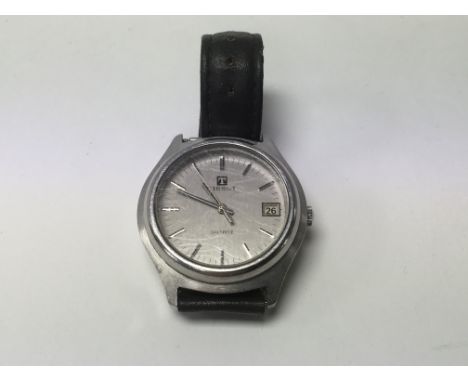 A Vintage gent's Tissot Quartz watch with date aperture - NO RESERVE
