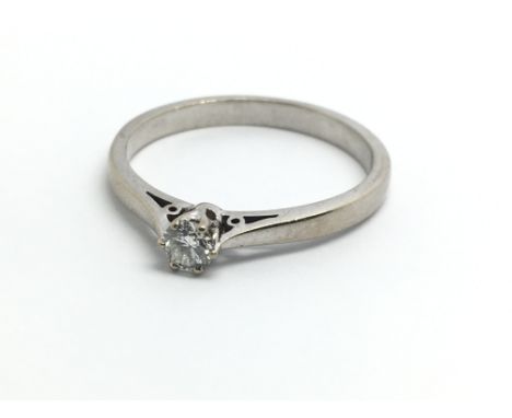 An 18ct white gold and diamond solitaire ring, approx 0.20ct, ring size approx R