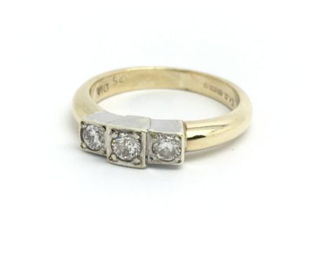 A 9ct yellow gold and three stone diamond ring, approx 0.15ct, size approx I