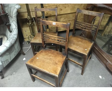 Three 19th century East Anglian Vernacular chairs beech and elm with button ball to the backs and solid seats on square legs.