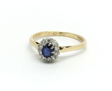 A vintage 18ct gold sapphire and diamond cluster and ring, ring size approx O