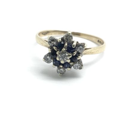 A 9ct yellow gold sapphire and diamond cluster ring, size approx H/I