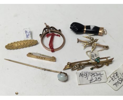 A collection of gold brooches Set with seed pearl a stick pin set with an opal And other oddments approximately 6-8g of 9ct g