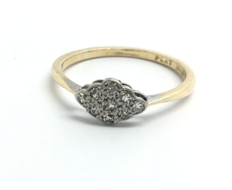 An 18ct platinum and diamond ring, ring size approx L