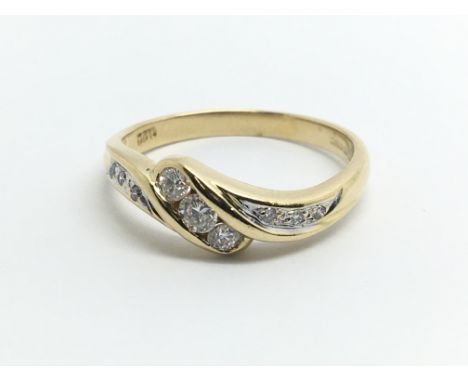 An 18ct yellow gold and diamond ring, approx 0.22ct, ring size approx N/O