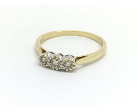 An 18ct yellow gold and three stone diamond ring, approx 0.20ct, ring size approx R