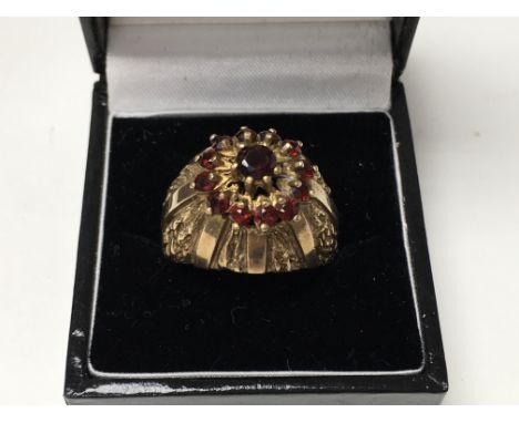 A 9ct gold and garnet ring (9.3g) R.