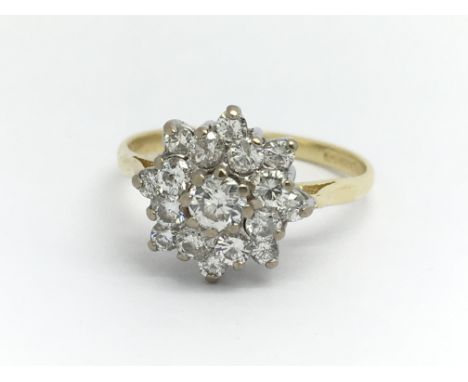 An 18ct yellow gold and diamond cluster ring, approx 0.5ct, ring size approx J/K