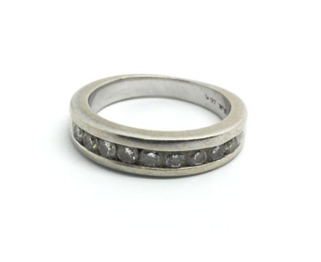 A 14ct white gold half eternity ring, set with a row of nine diamonds, approx 0.40ct, ring size approx J/K