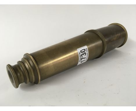 A heavy brass three drawer telescope stamped Broadhurst Clarkson &amp; Co London 1942