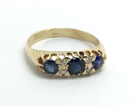 A vintage 18ct yellow gold sapphire and diamond ring, approx size O