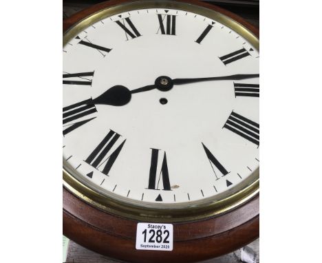 A mahogany drop dial wall clock the enamel dial with Roman numerals.