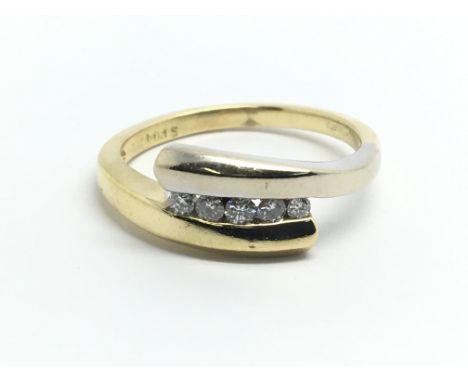 An 18ct yellow gold ring set with five diamonds, approx 0.20ct, ring size approx O