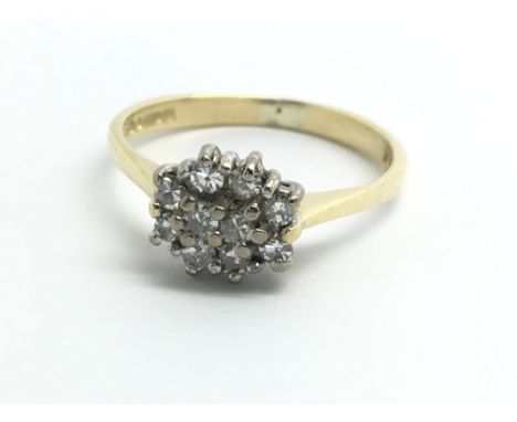 An 18ct yellow gold diamond cluster ring, approx 0.25ct, size approx J/K