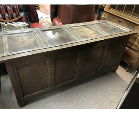 An 18th large oak panelled trunk, 165 x 58 x 70cm