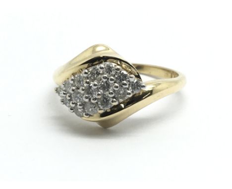 An 18ct yellow gold and diamond cluster ring, approx 0.25ct, size approx K/L