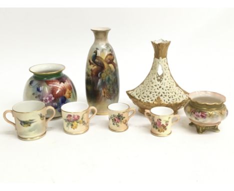 A collection of eight pieces of decorative Royal Worcester items including vases, pots and miniature tankards