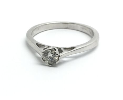 An 18ct white gold and diamond solitaire ring, approx 0.28ct, ring size approx P
