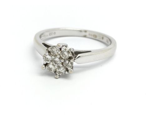 An 18ct white gold and diamond cluster ring, approx 0.33ct, ring size approx Q