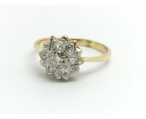 An 18ct yellow gold and diamond cluster ring, approx 0.20ct, ring size approx L/M