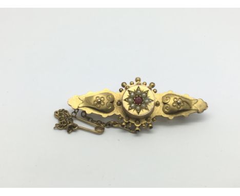 A 9ct gold pearl and ruby brooch, approx 3.5g.