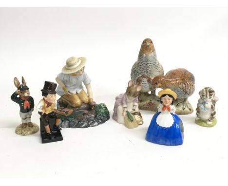 A quantity of porcelain figures including Beswick, Carltonware and Royal Doulton