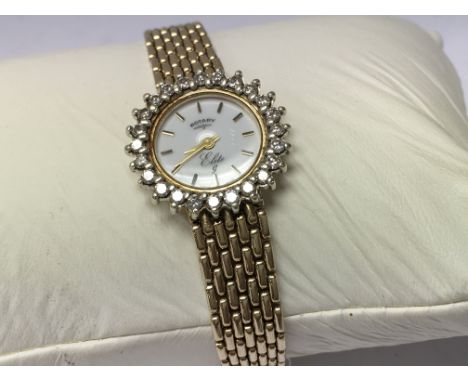 A ladies Rotary Elite G 9ct gold and diamond set bezel.