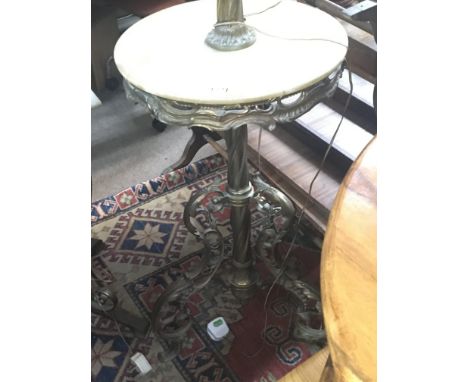 A brass and onyx telescopic oil lamp with a spiral twist column scroll base
