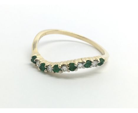 A 14ct yellow gold, diamond and sapphire half eternity ring, approx size Q