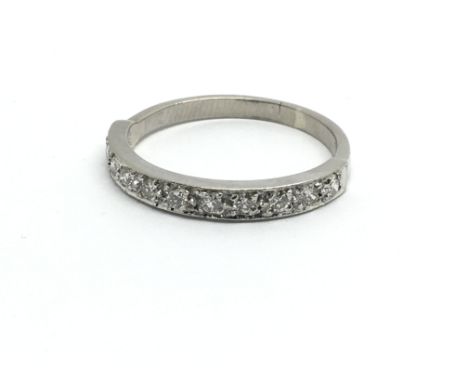 An 18ct white gold eleven stone diamond ring, approx 0.5ct, ring size approx J/K