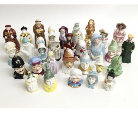 A large collection of mainly Royal Worcester candle stuffers of various designs