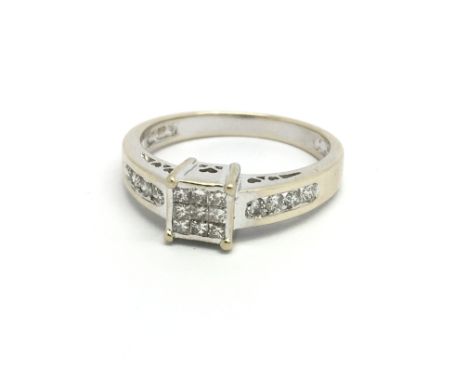 An 18ct white gold and diamond ring, size approx K/L