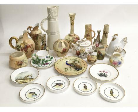 A collection of Royal Worcester ceramics including vases and decorative jugs