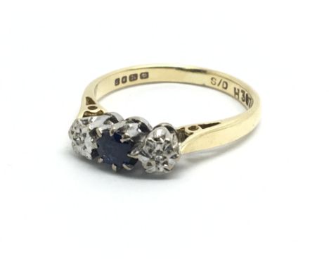 An 18ct yellow gold, diamond and sapphire ring, ring size approx K